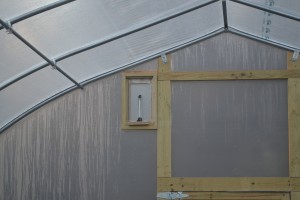 A small temperature controlled window is installed and working high up in the ends (this automatic helps control the temperature of the interior of the High Tunnel) 